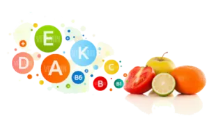A graphic showing colorful vitamin icons alongside fresh citrus fruits, representing essential vitamins and nutrition for seniors.