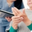 A caregiver provides in home care services to a senior with arthritis