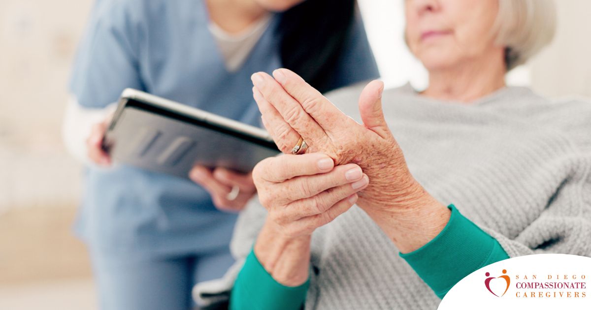 A caregiver provides in home care services to a senior with arthritis