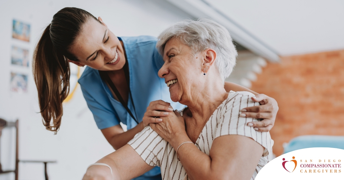 A female caregiver helping an older woman with stroke recovery at home.
